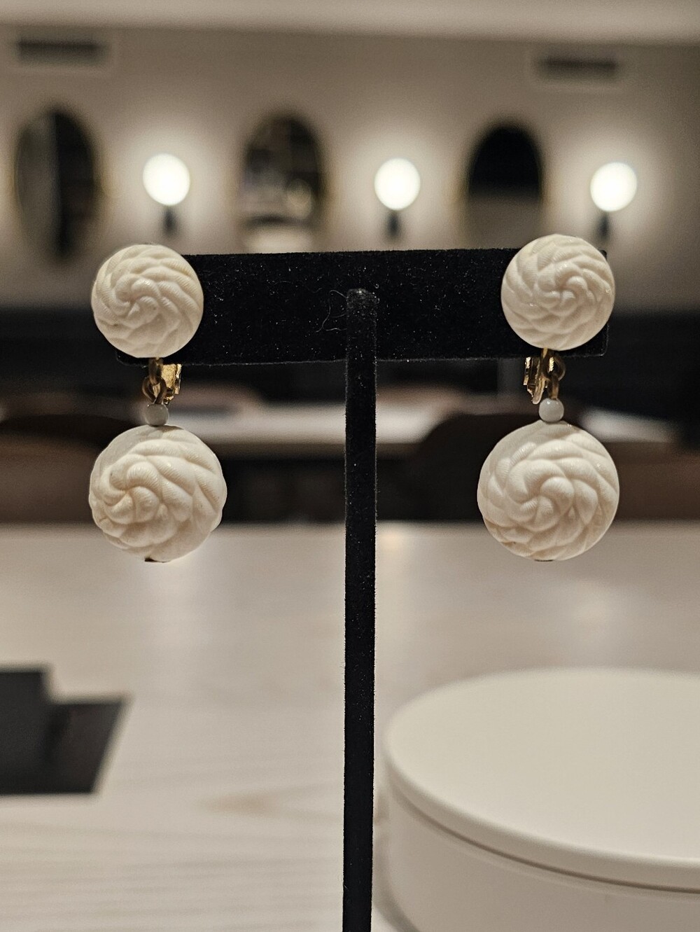 Vintage Napier White Carved Floral Double Drop Clip On Earrings